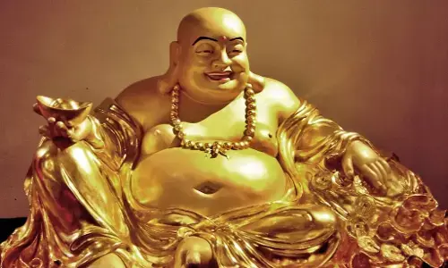 வீட்டின் அதிர்ஷ்டத்தை பெருக்க சிரிக்கும் புத்தர் சிலையை வைக்கலாமா?