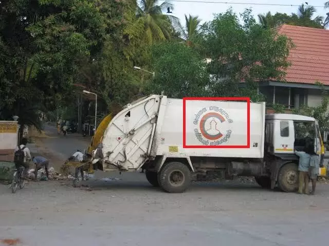 குப்பை வண்டியில் சிலுவை லோகோ-பாஜாகாவின் எதிர்ப்பால் மாற்றம்?