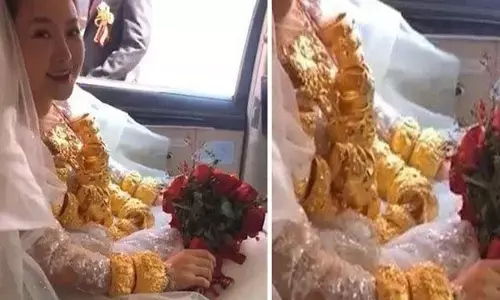 சீனாவில் அரங்கேறிய மிகப்பெரிய திருமணம்: வைரல் ஆகிவரும் 60 கிலோ தங்கப்பரிசு !