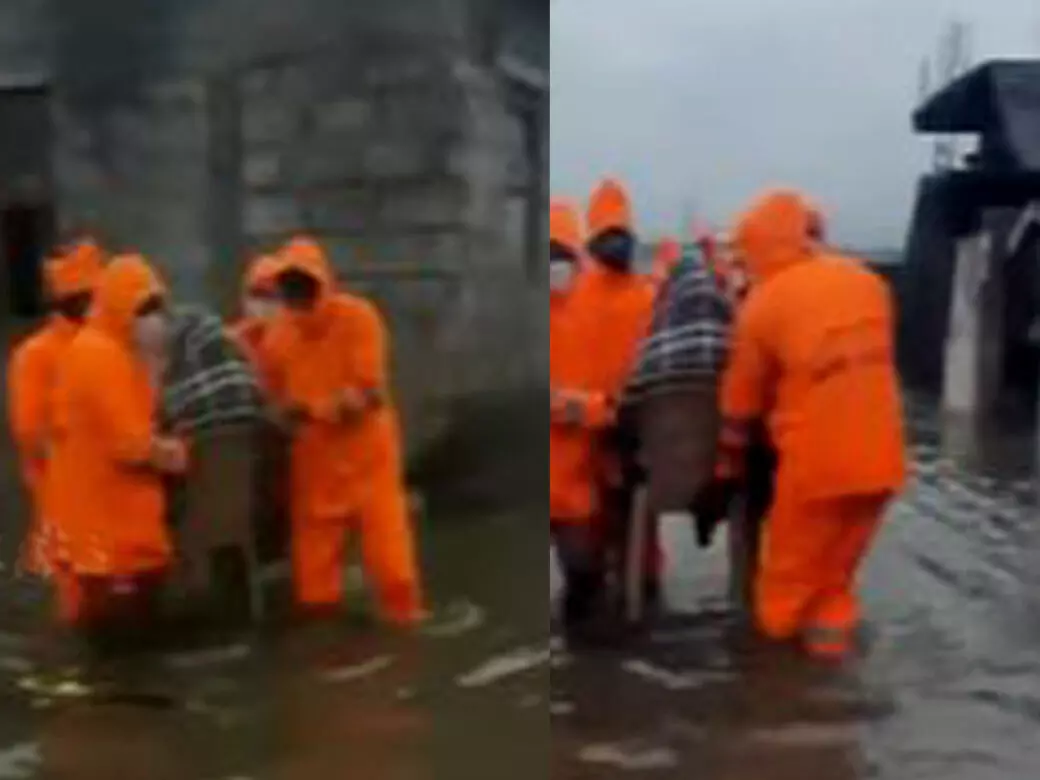 தி.மு.க கோட்டை  சென்னையில்  பச்சிளம் குழந்தையுடன் வெள்ளத்தில் சிக்கிய பெண்!