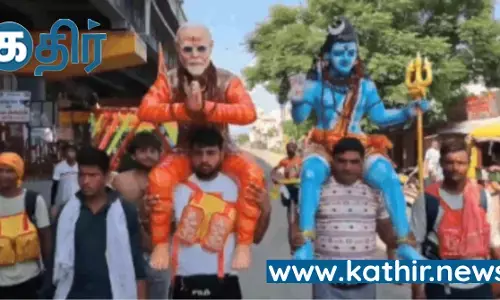 பிரதமர் சிவனின் பக்தன், நான் மோடியின் பக்தன்: பிரதமர் மோடியின் சிலையை தோளில் சுமந்த ரூபேந்திர தோமர்!